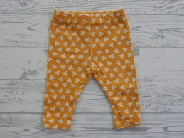 Hema broekje legging oker geel wit driehoekjes maat 56