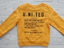 Born by Kiddo United sweater geel zwart tekst print maat 74