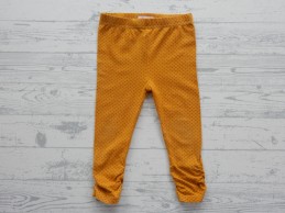 Legging oker geel zwart dessin plooitjes maat 80