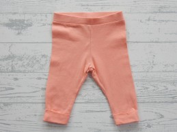 Broekje newborn tricot licht oranje maat 56