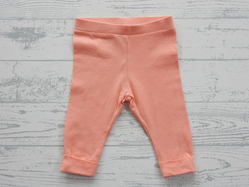 Broekje newborn tricot licht oranje maat 56