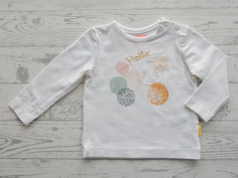 Hema newborn longsleeve wit cirkels smile Hello maat 56