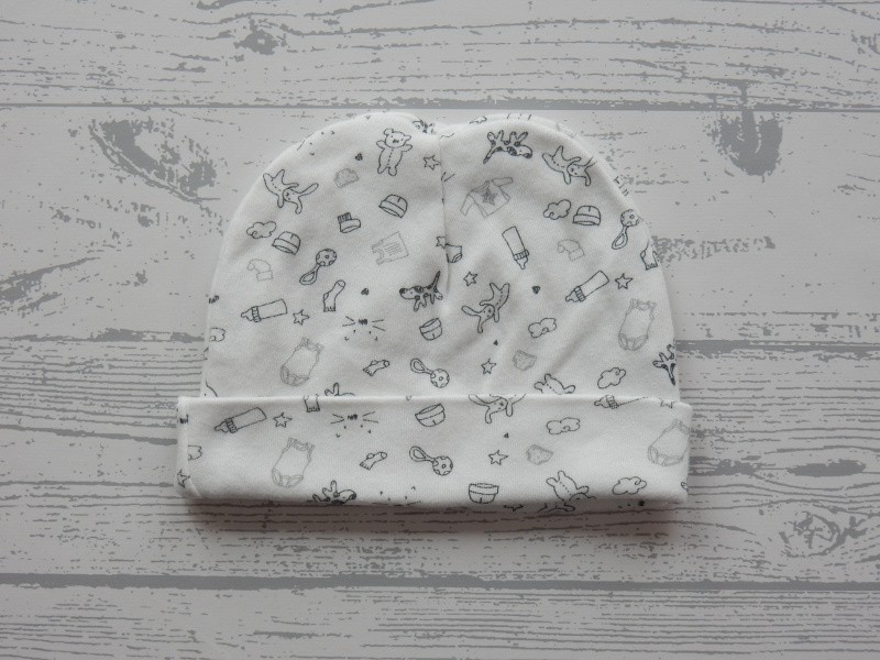 Hema newborn mutsje off white zwart dessin doodles 1 maat
