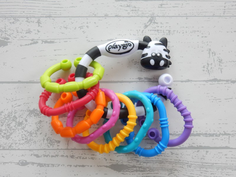 Playgro 9 links schakelringen bijtringen Zebra 9 stuks