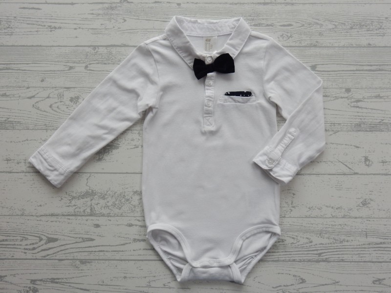 H&M romper met kraag lange mouw wit zwart strikje maat 86