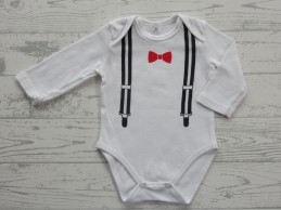 Romper lange mouw wit zwart rood strikje met bretels maat 50-56