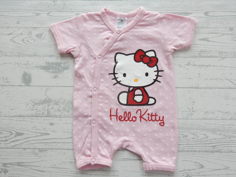 H&M jumpsuit boxpak roze wit stippen Hello Kitty maat 50